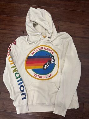 Aviator Nation Relaxed Cream Hoodie with Rainbow Logo and Sleeve Print